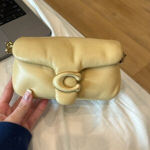 Coach yellow pillow tabby